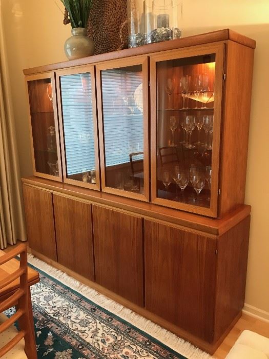 Danish Modern teak display cabinet by Skovby Mobelfabrik.  Two piece, glass doors lift off for easy transporting.  Overall dimensions 80.5" wide, 19" deep, 71.75" tall.  Excellent condition