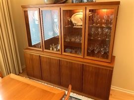 Danish Modern teak display cabinet by Skovby Mobelfabrik.  Two piece, glass doors lift off for easy transporting.  Overall dimensions 80.5" wide, 19" deep, 71.75" tall.  Excellent condition