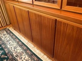 Danish Modern teak display cabinet by Skovby Mobelfabrik.  Two piece, glass doors lift off for easy transporting.  Overall dimensions 80.5" wide, 19" deep, 71.75" tall.  Excellent condition