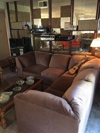 Nice L shaped sectional sofa, very clean and surrounded by vintage electronics! A rare vintage Concord 727 tape recorder, vintage AR speakers, Nikko receiver, Teac tape player and Optimus record player!