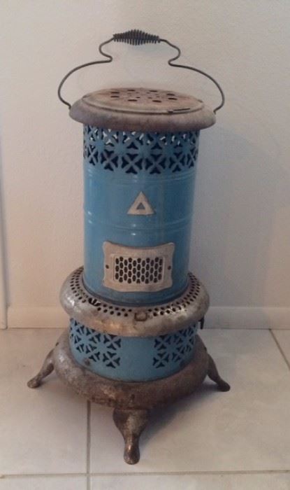 Antique BLUE enamel ware Perfection Oil Heater from the early 1900's. Made in USA. 17" round at the bottom. Total height of 31"H including handle.