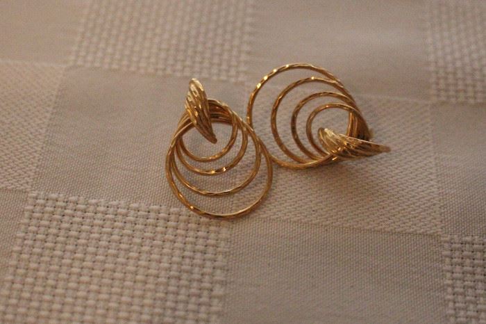 Pair of gold earrings.  