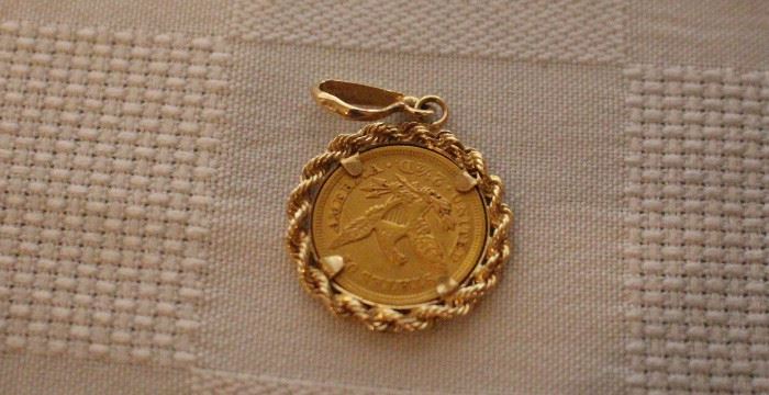 Gold coin pendant 