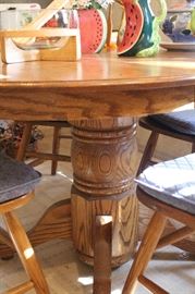 Oak pedestal table and chairs