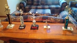 Sofa table and trophies
