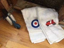 Scooter toy and hand towels.