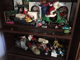 Display case, Christmas ornaments, more scooter toys and chotskies
