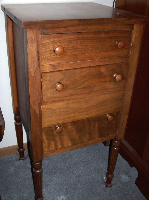                    Three drawer sewing cabinet