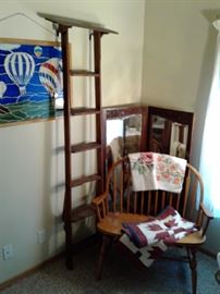 Antique library ladder and folding mirror.  Great handcrafted hot air balloon framed stain glass.  One of many throughout the home.  