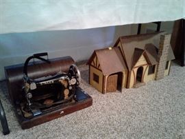 Antique Singer sewing machine with domed case and wonderful old dollhouse