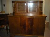 Gorgeous buffet with slide out drawers and china closet top. Two pieces.
62 1/2" wide, 66" Tall