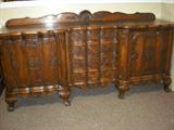 Stunning carved buffet (not appliqued) with original hardware.7'5" wide, 38" Tall. Carved back on buffet 6.5"