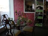 Francescan Pottery and Lennox Green Glasses. Green Depression Glass. Glass top carved pedestal table with 4 matching chairs. Excellent condition