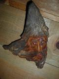Wood carving and signed.