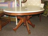 Marble top walnut table.
