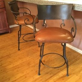 Beautiful pair bar stools with metal and leather seats, deluxe, comfortable, any bar would feel privileged