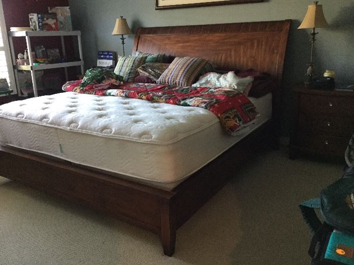 Fabulous king bed that accommodates king or cal king mattress, this one King, excellent condition, matches nightstands and dresser