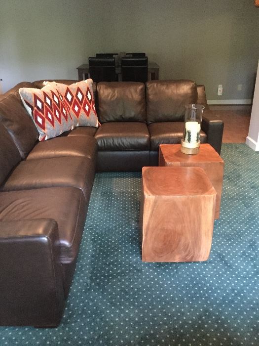 Incredible grade leather from American Leather. Brown, leather sectional sofa. Wood tables not included in the sale. 