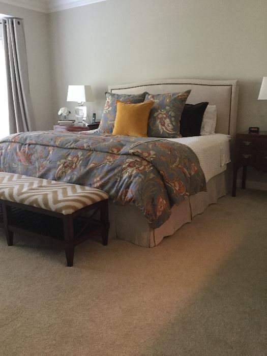William Sonoma Upholsterd king Bed with brass nail heads. Mattress NOT included. Bedding by Pottery Barn. 
