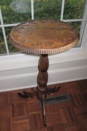 Chip carved pedestal stand.