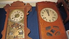 Clock on left has broken glass.