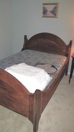 Three quarter bed with proper size mattress and spring.