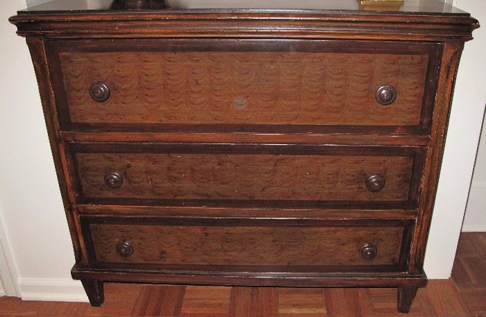 Baker Furniture Co. believe it or not. Grain paint and top drawer opens into a butler's desk. Very unusual for Baker.