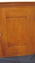 Wavy grain painted small one door cupboard.