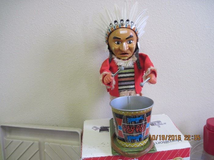 Wind up toy...missing top of his drum