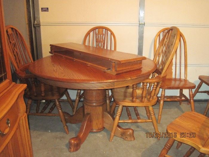 Oak pawfoot  table, two leaves, 6 chairs and china hutch