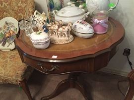 Round leather top occasional table. Small decoratvices