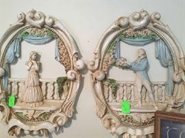 Vintage wall plaque of boy and girl