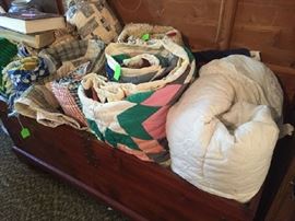 Cedar chest and quilts