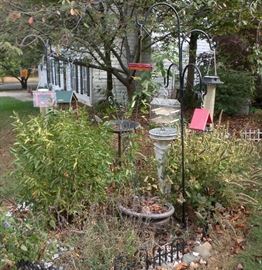 Some of the bird feeders, bird bath & sun dial