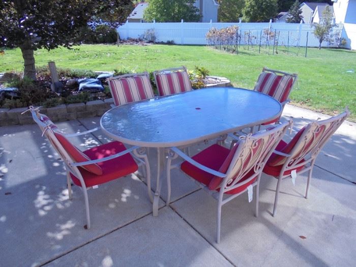 Oval Glass Patio Table with 6 Chairs and Cushions( also with Blue Umbrella and White weighted Stand not pictured)
Condition: Good
Shipping: No
