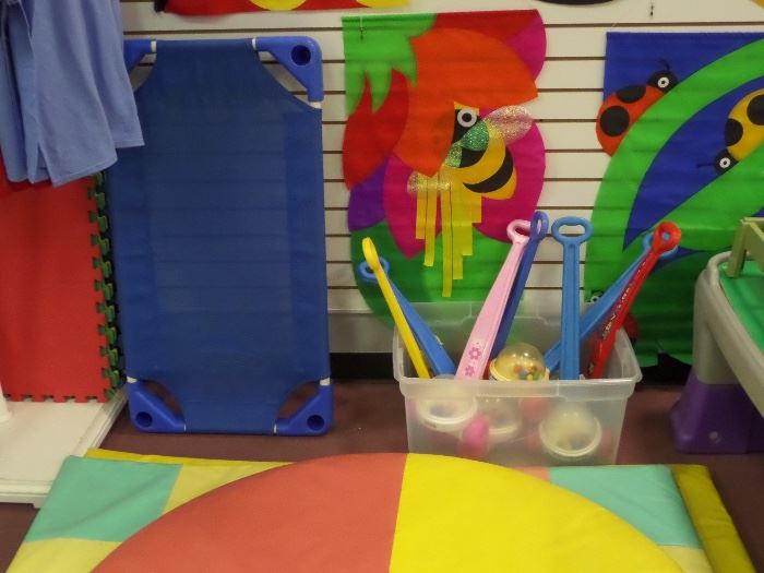 Child's cot, playmats, & pushtoys.