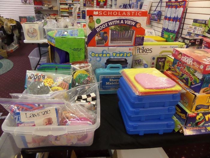 Infant development toys, storytelling kits, Fisher Price Barnyard Bingo and more....