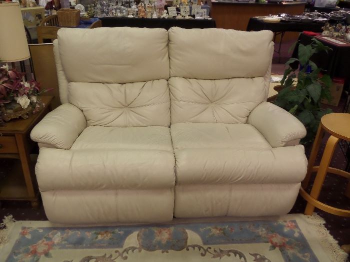 This double recliner LEATHER loveseat is SO COMFORTABLE!  You really won't believe it until you try it out....