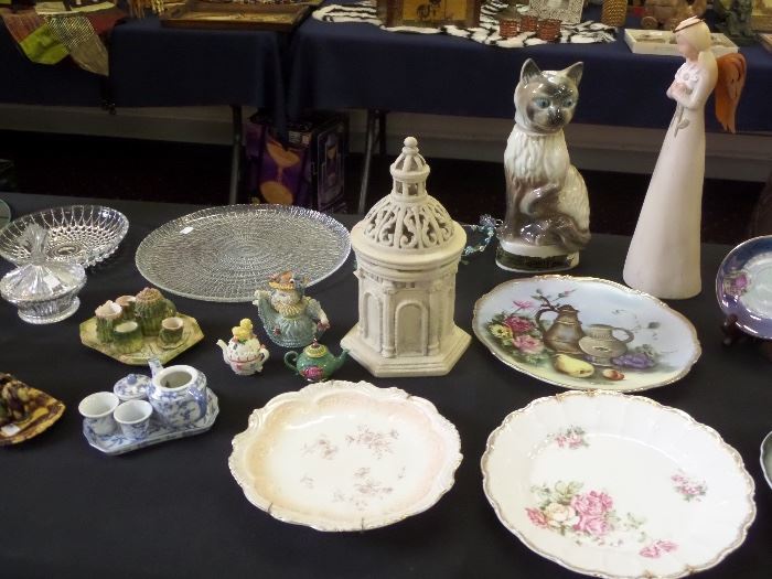 More vintage and miniature tea sets.