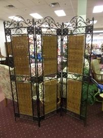 Wrought iron wicker room divider.