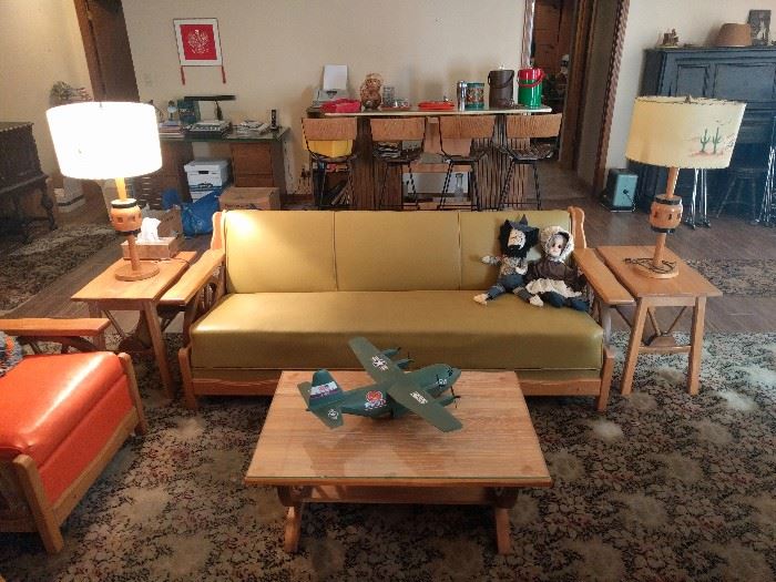 1960's Man Cave Deluxe! Yep, an entire suite of cowboy-ed up, swanky Dude Ranch-style furniture, by the Westwood Corp, San Marcos, TX, with lamps to match.                                                                                   Yep, the JC Penney desecrator didn't miss a beat with this lovely treatment. Happy Trails!