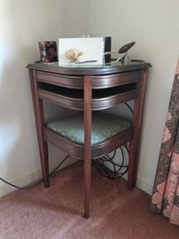 Of course this piece of furniture would be located in the "porn room", as it's been bad and placed in the corner. Actually, this is a very cool corner desk, I'm guessing a telephone table?                                                                         The next pic shows how the piano hinge opens to reveal a space-saving mahogany corner desk!