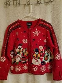 There are 28 (+8 vests!) of these amazingly kooky Christmas sweaters to wow and amaze all of your Facebook friends, co-workers, neighbors & church buddies - tacky splendor at its finest!
