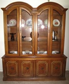 A Traditional Style All Wood China Cabinet with 4 Doors in the original "Crete Wheat" Factory Finish.