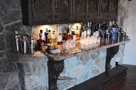 Carved Bar Cabinet and Baseboard, Petrified Wood Bar, Decanters, Crystal Barware