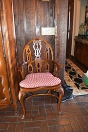 Windsor style chair with custom red & white pad.