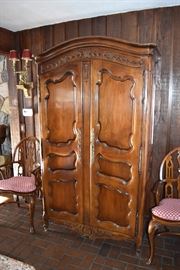 Windsor style chair with custom red & white pad. French-style Armoire
