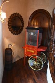 Popcorn Machine, Leather Baker Sunburst Mirror, Barrel Umbrella Stand, Antler Sconce