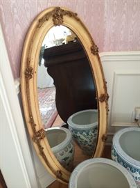 One of several mirrors; large planters