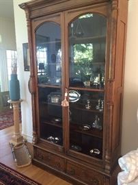 Antique display cabinet; large selection of  silver plate serving pieces